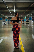 Pantalón alto estilo palazzo